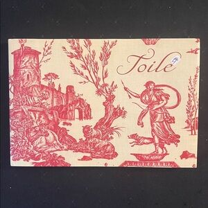 Hardcover art book titled “Toile”